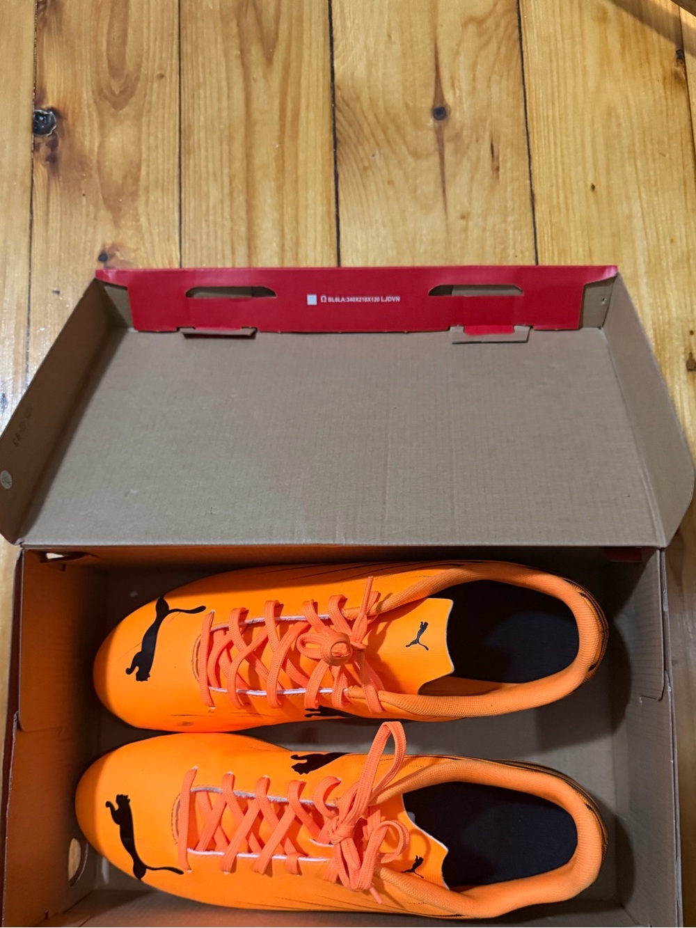 Puma Bright Orange Soccer Cleats with Black Logo